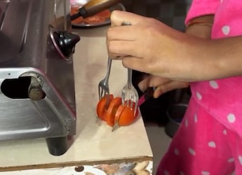 Watch: Woman's 'Jugaad' To Slice Tomatoes Using Fork Gets Over 30 Million Views Watch: Woman's 'Jugaad' To Slice Tomatoes Using Fork Gets Over 30 Million Views