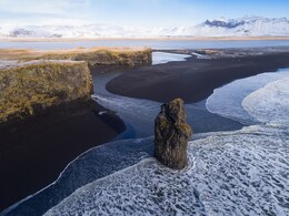 5 Stunning Black Sand Beaches That'll Redefine Your Beach Getaways