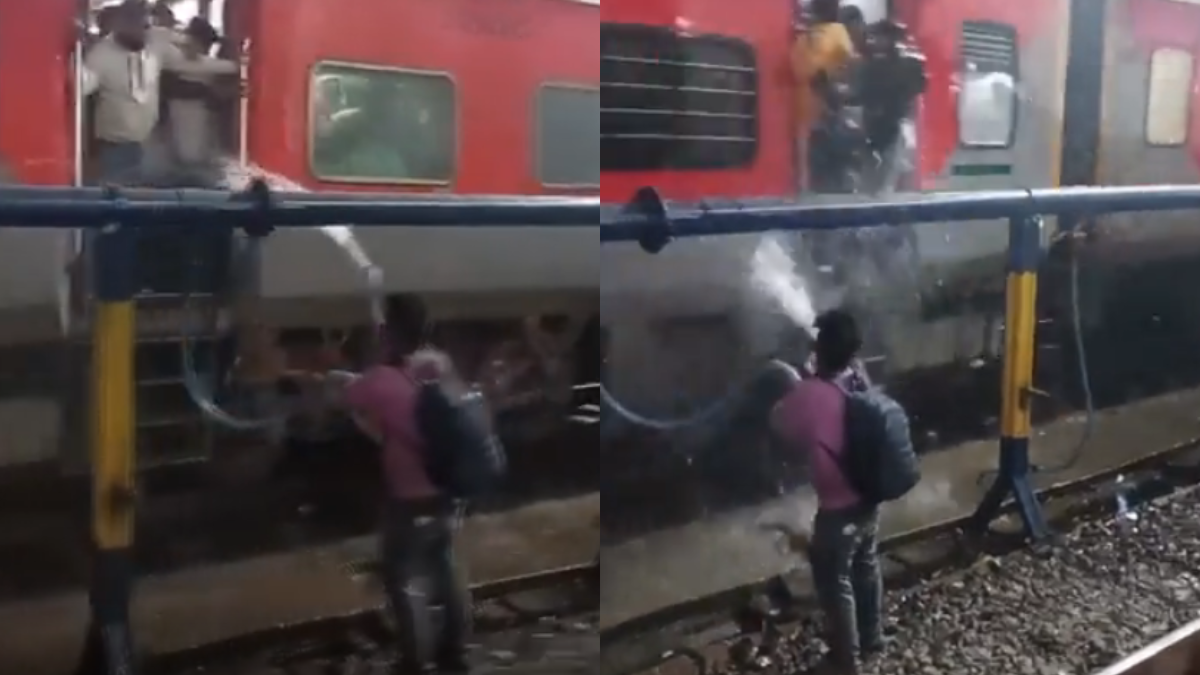 Watch: Man Sprays Water On Train Passengers Standing At Open Doors, Internet Reacts