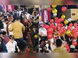 शादी में जी का जंजाल बने गुब्बारे, लपकने के लिए दूल्हा-दुल्हन पर कूद पड़े बाराती, देख सटका दूल्हे का माथा