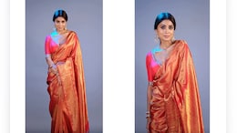 Shriya Saran Is A Picture Of Sheer Elegance In A Red <i>Benarasi Saree</i>