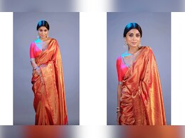 Shriya Saran Is A Picture Of Sheer Elegance In A Red <i>Benarasi Saree</i> Shriya Saran Is A Picture Of Sheer Elegance In A Red <i>Benarasi Saree</i>
