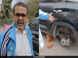 AAP Leader Avadh Ojha's Car Wheels Stolen In Delhi AAP Leader Avadh Ojha's Car Wheels Stolen In Delhi