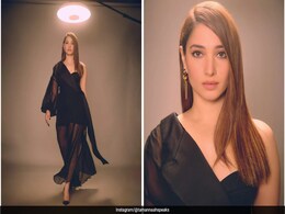 Tamannaah Bhatia Enhances Her Sheer Black Dress With Serpentine Earrings Designed By Her Tamannaah Bhatia Enhances Her Sheer Black Dress With Serpentine Earrings Designed By Her