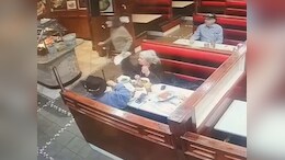 On Camera, Man Sitting At Restaurant Hit By Philadelphia Plane Crash Debris