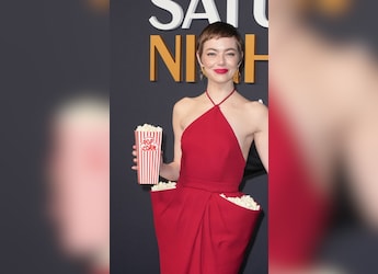 Emma Stone's 'Popcorn Dress' Is A Quirky Red Carpet Ode To The Beloved Snack Emma Stone's 'Popcorn Dress' Is A Quirky Red Carpet Ode To The Beloved Snack