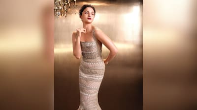 alia bhatt silver dress Alia Bhatt made a striking appearance at the BAFTA Awards 2026 in a custom silver sequined gown by Gucci. The halter-neck silhouette shimmered beautifully under the London lights. A soft white fur