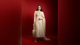 Karisma Kapoor Exudes Glam In An Ivory Coloured <i>Anarkali</i> Suit