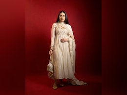 Karisma Kapoor Exudes Glam In An Ivory Coloured <i>Anarkali</i> Suit Karisma Kapoor Exudes Glam In An Ivory Coloured <i>Anarkali</i> Suit
