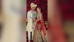 Aadar Jain Marries Alekha Advani: Bride Dons Traditional Red Sabyasachi <i>Lehenga</i> And Groom Picks Ivory <i>Sherwani</i>