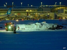 Plane With 80 Onboard Flips Over At Toronto Airport, 18 Injured Plane With 80 Onboard Flips Over At Toronto Airport, 18 Injured
