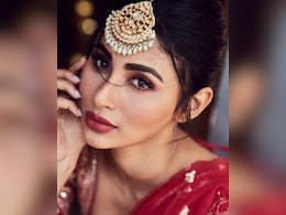 Mouni Roy Rounds Off Her Ethnic Glam With Red Lips And Wispy Lashes