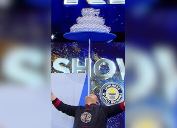 Watch: Man Balances 150 Wine Glasses On His Chin, Makes World Record Watch: Man Balances 150 Wine Glasses On His Chin, Makes World Record