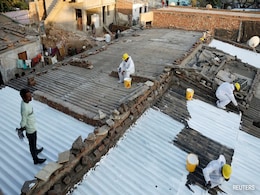 Gujarat Slums Get 'Cool Roofs' To Combat Extreme Heat Gujarat Slums Get 'Cool Roofs' To Combat Extreme Heat