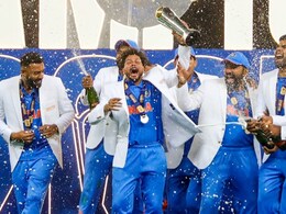 Mohammed Shami Steps Aside Amid Champagne Shower During India's Champions Trophy Celebration - Watch