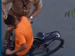 Video: Cop Slaps Boy, Pulls Hair For Cycling During PM Convoy Rehearsal Video: Cop Slaps Boy, Pulls Hair For Cycling During PM Convoy Rehearsal