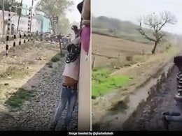 Video: Man Dangles From Moving Train Window While Performing Stunt, Rescued By Passengers Video: Man Dangles From Moving Train Window While Performing Stunt, Rescued By Passengers