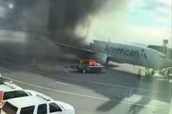 Video: American Airlines Plane Catches Fire At Denver Airport Video: American Airlines Plane Catches Fire At Denver Airport