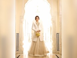 Kriti Sanon Aces Her Red Carpet Look In An Ivory Traditional Rajasthani <i>Poshak</i> And Sheer Lehenga