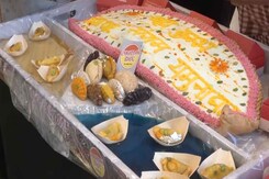 Lucknow's Sweet Shop Prepares India's Largest Gujia For Holi Celebration Lucknow's Sweet Shop Prepares India's Largest Gujia For Holi Celebration