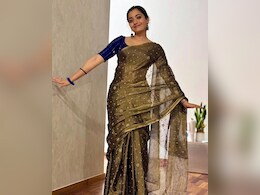 Rashmika Mandanna Exudes Elegance In A Minimal <i>Saree</i> Look