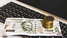 Rupee Gains 12 Paise To Settle At 85.68 Against US Dollar