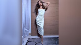 Eva Longoria Redefines Party Dressing In A Stunning Ivory Dress