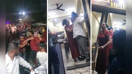 झूमा-झटकी, खुलेआम धमकियां... धार में शराबी महिला ने काटा बवाल