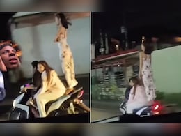 चलती हुई स्कूटी पर सीधे खड़ी हो गई लड़की, किया ऐसा खतरनाक स्टंट, देख दांतों तले दबा लेंगे उंगली चलती हुई स्कूटी पर सीधे खड़ी हो गई लड़की, किया ऐसा खतरनाक स्टंट, देख दांतों तले दबा लेंगे उंगली