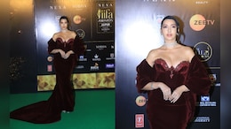 Nora Fatehi Exudes Solid Style Energy In A Stunning Maroon Gown At IIFA 2025