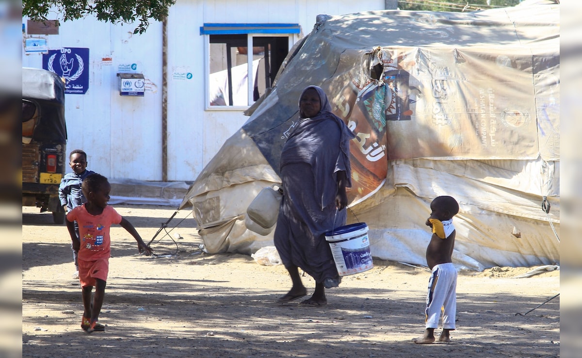 Port Sudan's displaced a Sudani woman and baby in the camp 