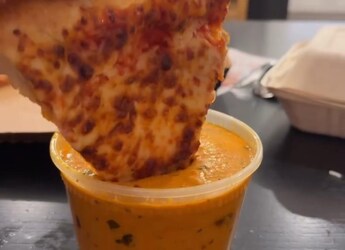 Watch: American Influencer Dips Pizza In Butter Chicken, Calls It  Watch: American Influencer Dips Pizza In Butter Chicken, Calls It
