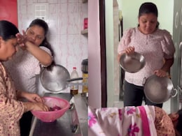 Watch: Daughter Tries To Help Mother In The Kitchen, Her Reaction Is Too Good To Miss Watch: Daughter Tries To Help Mother In The Kitchen, Her Reaction Is Too Good To Miss