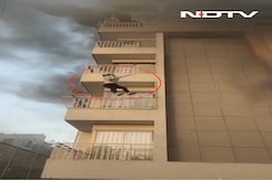 Video: Woman Jumps Off 5th Floor Of Ahmedabad Building To Escape Fire Video: Woman Jumps Off 5th Floor Of Ahmedabad Building To Escape Fire