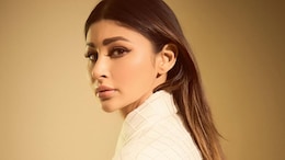 Mouni Roy Exudes Summer Glam In A White Oversized Blazer And A Mini Skirt