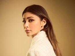 Mouni Roy Exudes Summer Glam In A White Oversized Blazer And A Mini Skirt Mouni Roy Exudes Summer Glam In A White Oversized Blazer And A Mini Skirt