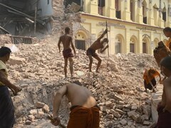 "Living In Hell": Monks Clear Rubble From Quake-Hit Myanmar Monastery