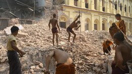 "Living In Hell": Monks Clear Rubble From Quake-Hit Myanmar Monastery