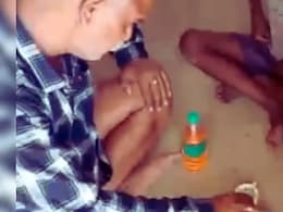 Madhya Pradesh School Teacher Seen Offering Alcohol To Students, Suspended Madhya Pradesh School Teacher Seen Offering Alcohol To Students, Suspended