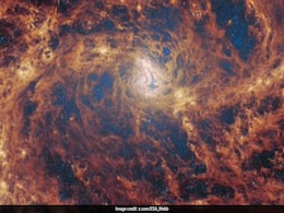 Signs Of A Supermassive Black Hole Hiding In Nearby Spiral Galaxy Signs Of A Supermassive Black Hole Hiding In Nearby Spiral Galaxy