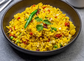 Bored Of Regular Poha? This Chatpata Kala Chana Poha Will Make For A Pleasant Change