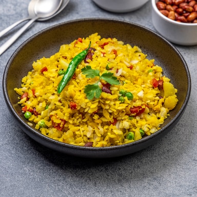 Bored Of Regular Poha? This Chatpata Kala Chana Poha Will Make For A Pleasant Change