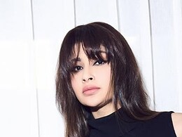 Mouni Roy Exudes Glam In A Black And White Outfit