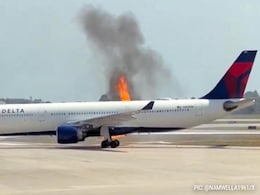 Delta Plane Catches Fire, Passengers Evacuated On Emergency Slides Delta Plane Catches Fire, Passengers Evacuated On Emergency Slides