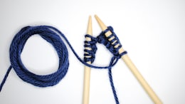 Flight Attendant Scolds Passenger For Knitting, Triggers Social Media Debate