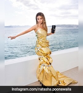 Natasha Poonawalla Shines Bright At Cannes 2025 In A Balenciaga Gold Foil  Gown