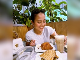 Neha Kakkar Enjoys Croissants At Cafe, Spills Coffee While Laughing Hard Neha Kakkar Enjoys Croissants At Cafe, Spills Coffee While Laughing Hard