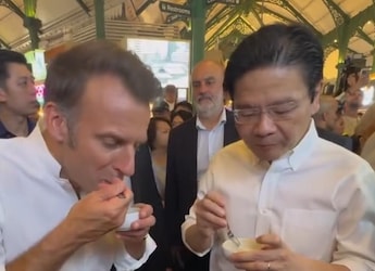 Watch: Emmanuel Macron Gets A Taste Of Singapore Hawker Culture Watch: Emmanuel Macron Gets A Taste Of Singapore Hawker Culture