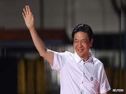 Singapore PM Unveils New Cabinet After Landslide Election Singapore PM Unveils New Cabinet After Landslide Election