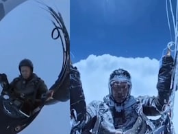Chinese Paraglider's Narrow Escape From Cloud Vortex At 26,400 Feet Chinese Paraglider's Narrow Escape From Cloud Vortex At 26,400 Feet